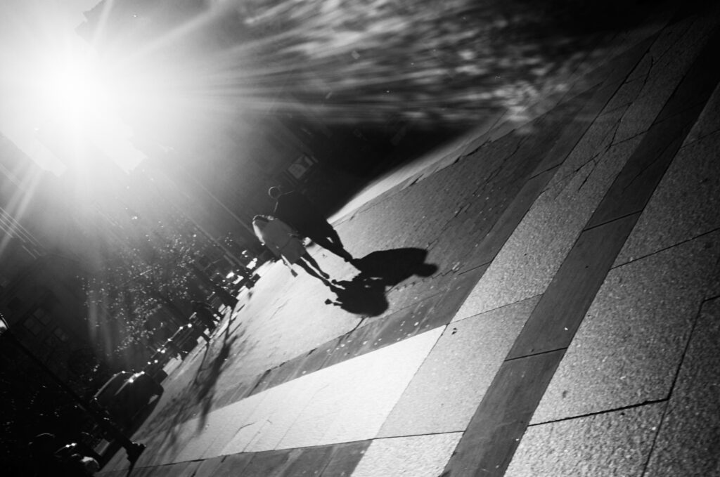New York Wedding Photographer, black and white image of couple walking together